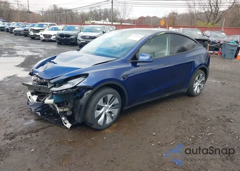 2023 Tesla Model Y Awd/Long Range Dual Motor All-Wheel Drive z USA, uszkodzony, nr VIN 7SAYGDEE6PA145968